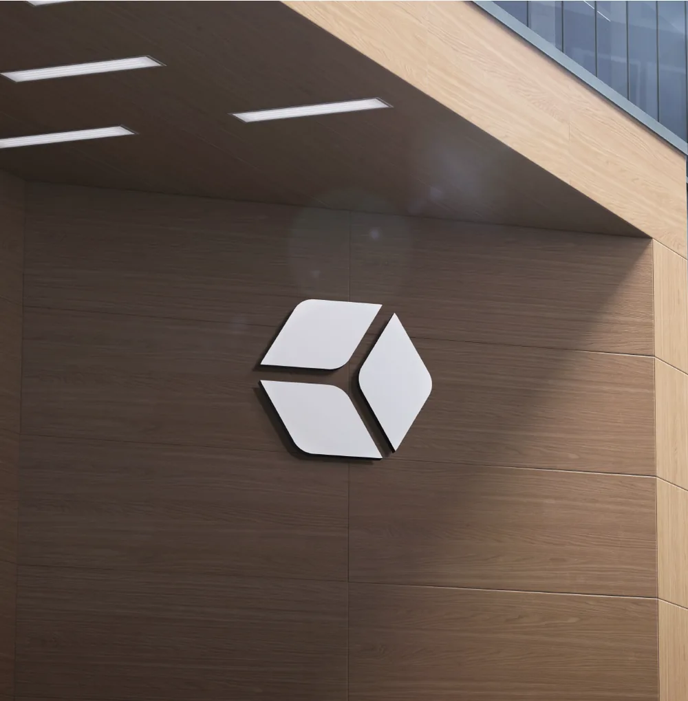 The mark as signage on a timber wall, as designed